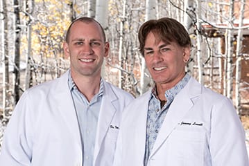 duo-dentist-team-aspen-smile-dentistry-aspen-co-dr-jeremy-lowell-dr-ian-lowell-monogrammed-on-dental-lab-coats